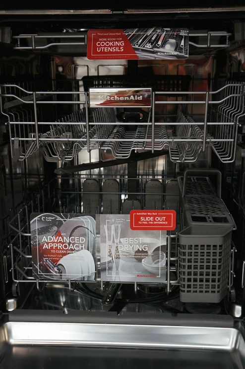 The KDTE334D dishwasher features a three-rack storage system.