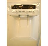 The refrigerator has an external water/ice dispenser for additional convenience.