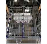 The lower rack of the LDS5540[ ] has foldable tines and a three-piece cutlery basket.
