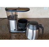 The Bonavita comes with a separate pour lid that needs to be put on after the brew cycle.